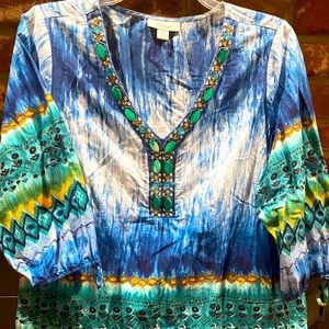 100% cotton pullover blouse.